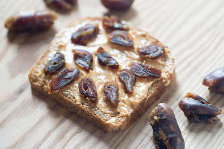 Healthy vegan sandwich on wooden background selective focus