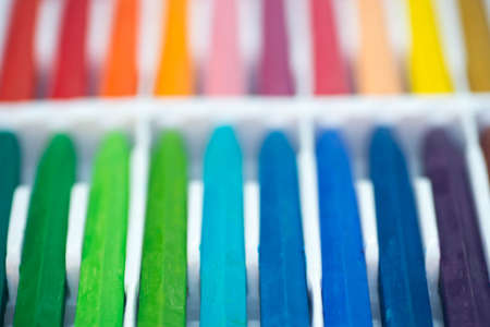 multicolored crayons in plastic box selective focusの写真素材