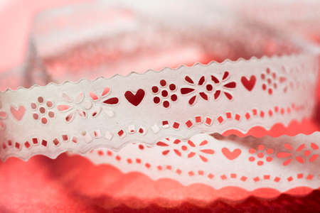 Decorative ribbon with hearts selective focus macroの写真素材