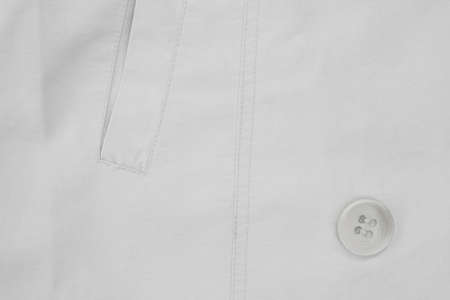 ecru  fabric with pocket and button background texture