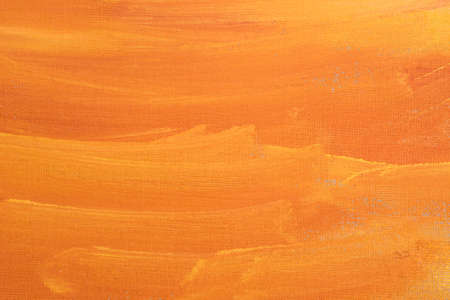 orange artistic abstract painted texture on paper backgroundの写真素材