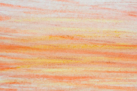 orange color watercolor crayon drawing background textureの写真素材