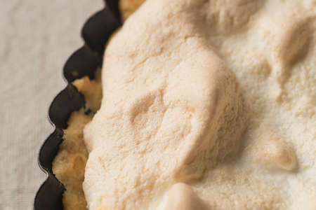 lemon curd tart with meringueの写真素材