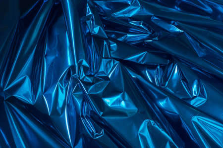 blue color folded metallic foil abstract bacgkgroundの写真素材