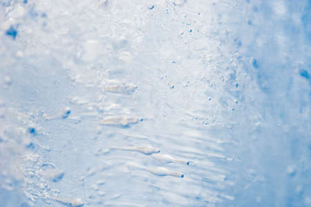 winter blue color  ice background texture macroの写真素材