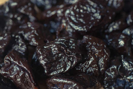 group of prunes dried plums macroの写真素材