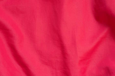 nylon red color waterproof textile background textureの写真素材