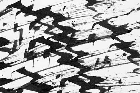 distressed monochrome black pattern on white paper background textureの写真素材