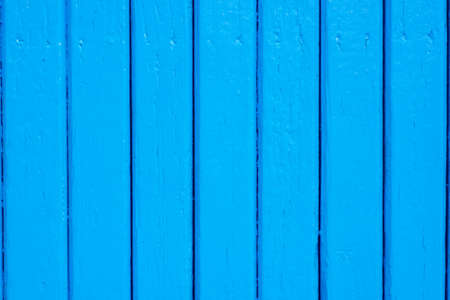 blue color painted wooden boards wall background textureの写真素材