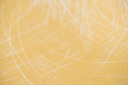 beige color  scratched macro background texture selective focusの写真素材