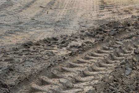 Tire track on mud background.の写真素材