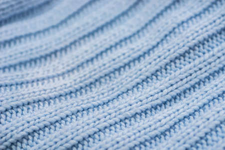 blue color waved knitwear texture background macroの写真素材