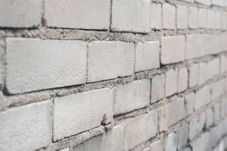 old gray brick wall background textureの写真素材