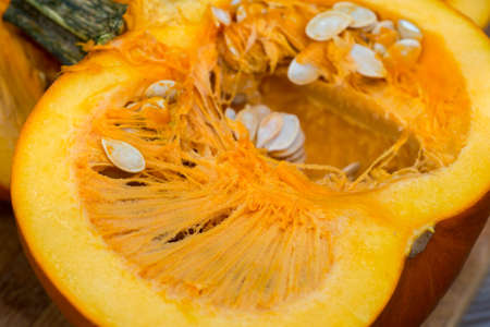 piece of pumpkin with seeds macroの写真素材