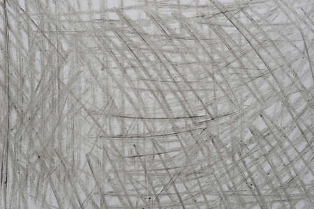 gray color crayon doodles on paper background texture