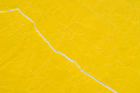 yellow torn paper with copy space  background texture macro