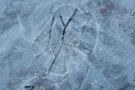 cracked ice on pool background texture macroの写真素材