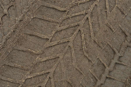 tire print on ground backgroundの写真素材