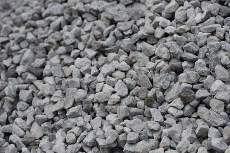 closeup to heap of gray gravel stones selective focus