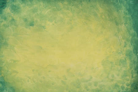 green and yellow color painted on paper background texture