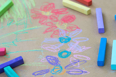 hand drawing on recycled paper - colorful flowers macro