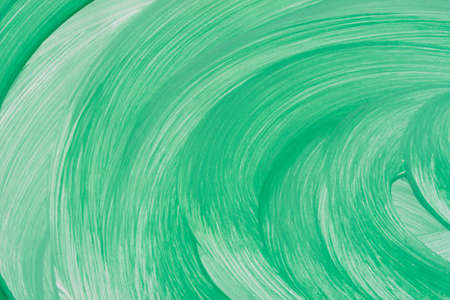 green color painted circle pattern on white paper background textureの写真素材