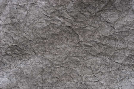 black color creased pastel paper background texture