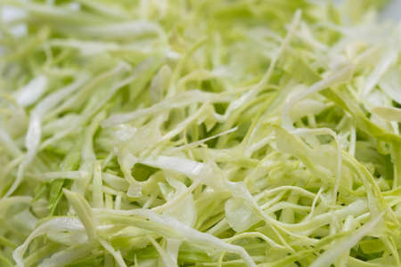 chopped cabbage on plate closeupの写真素材