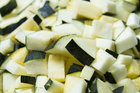raw chopped zucchini, courgette closeupの写真素材