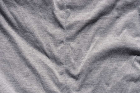 creased gray color textile background textureの写真素材