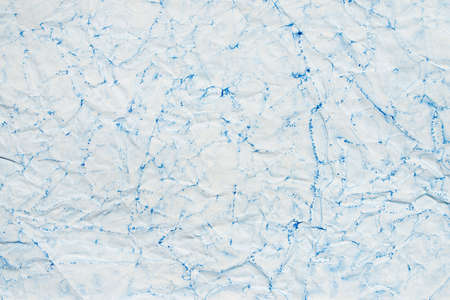 blue color painted paper backgound textureの写真素材