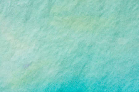 blue color watercolor painted background textureの写真素材