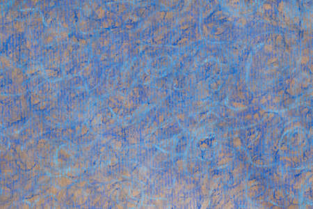blue color crayon doodles on recycled paper background textureの写真素材