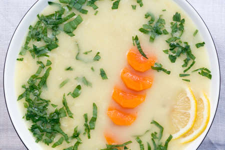 bowl with lemon soup on table closeupの写真素材