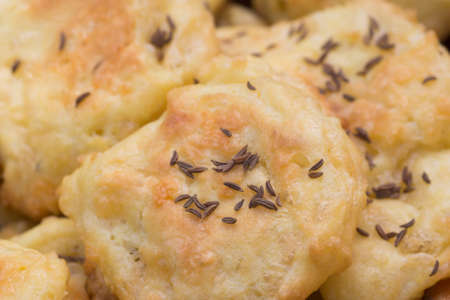 savory cheese puffs on plate closeup selective focus