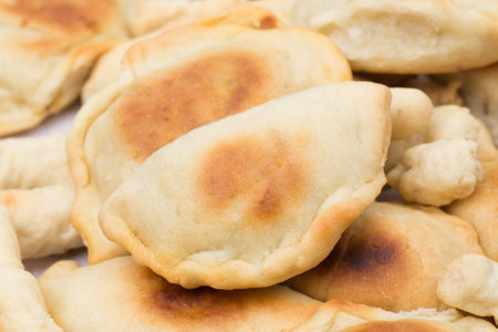 baked vegan dumplings on plate closeup selective focusの写真素材