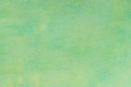 green painted on paper watercolor background textureの写真素材