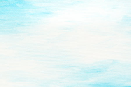 blue painted watercolor on paper background textureの写真素材