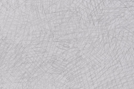 gray pencil doodles on white paper background texture