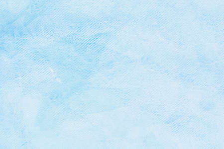 blue painted watercolor on paper background textureの写真素材