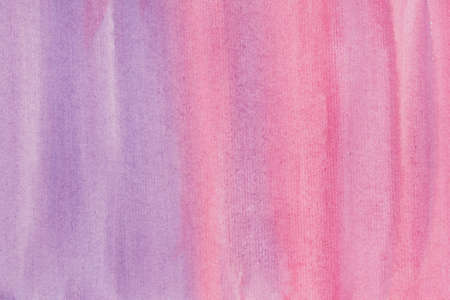 pink and lila painted watercolor paper background textureの写真素材