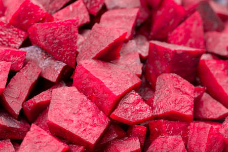 chopped raw beet root vegetable closeup selective focus