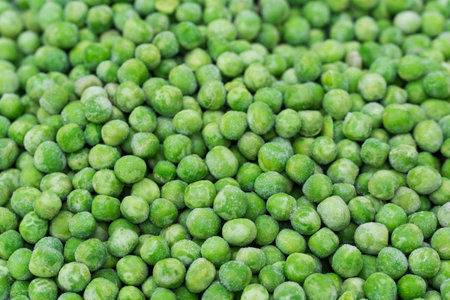 group of frozen green peas closeup selective focusの写真素材