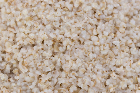 boiled healthy barley groats closeup selective focusの写真素材