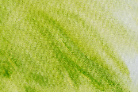 green and white painted watercolor on paper background textureの写真素材