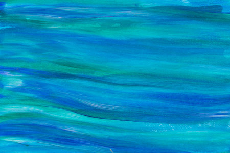 Blue and turquoise painted on paper background textureの写真素材