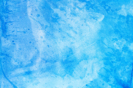 acrylic blue painted background on paper textureの写真素材