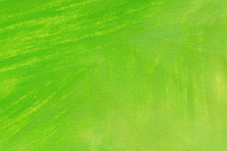 green color painted background on paper textureの写真素材