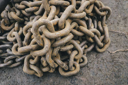 Old rusted chains view from the top.の写真素材