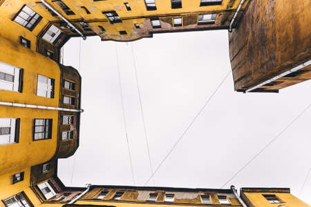 From bottom view on roof of old houseの写真素材